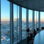 people sitting on chair near glass window during daytime