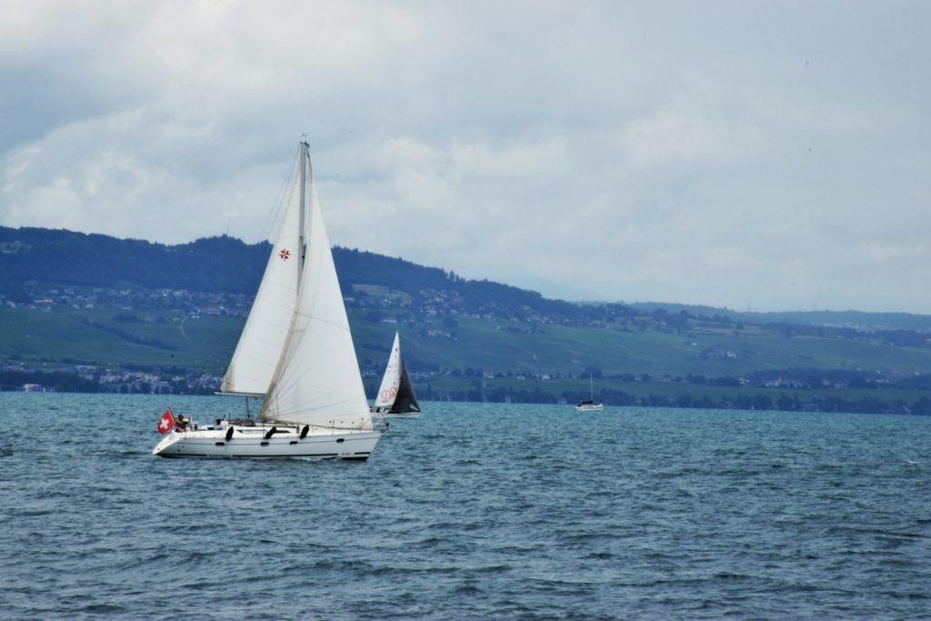 A sailboat sailing on a large body of water