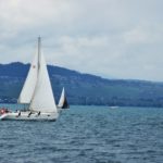 A sailboat sailing on a large body of water
