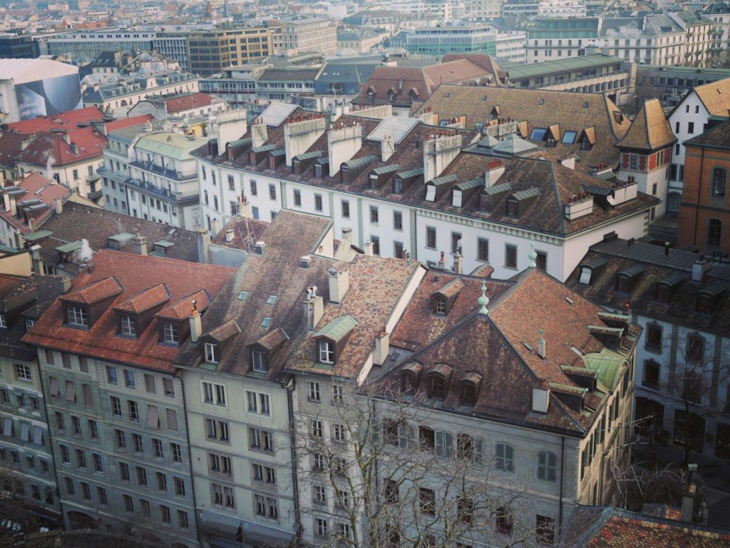 An aerial view of a city with many buildings
