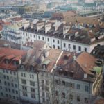 An aerial view of a city with many buildings