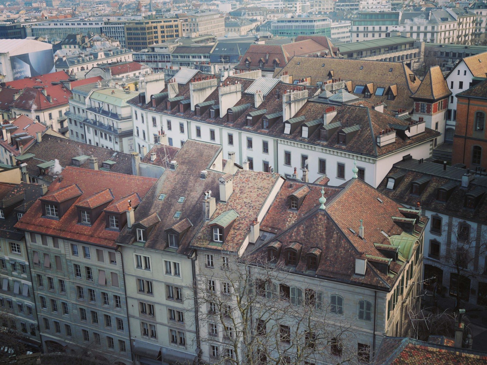 An aerial view of a city with many buildings