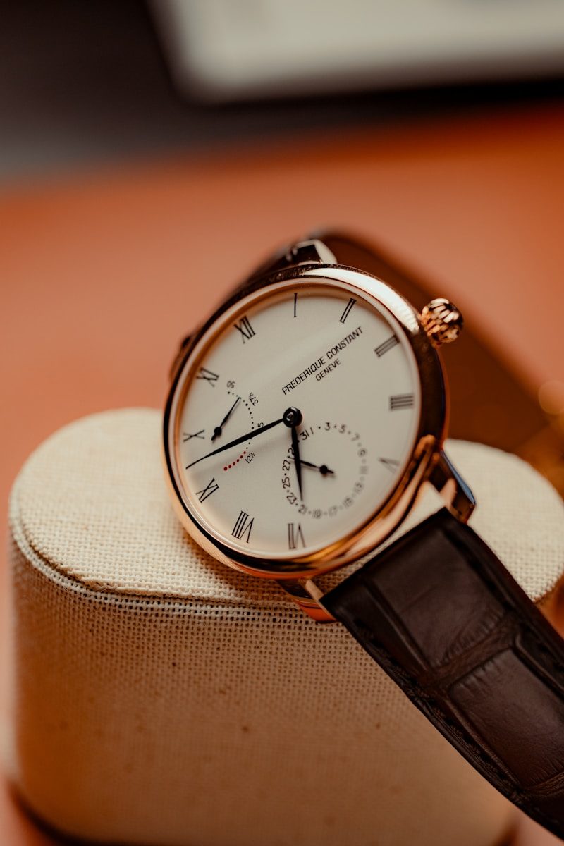 A close-up of a luxury rose gold wristwatch.