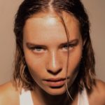 woman in white tank top